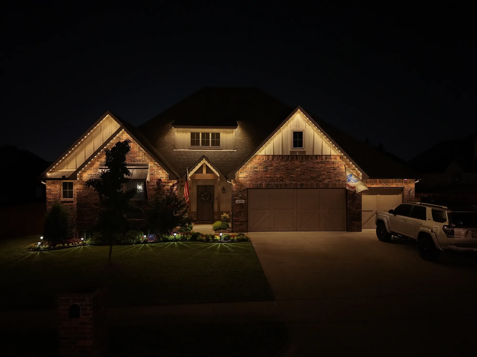 Roofline set to warm white. Permanent Lighting by LIT Outdoor Lighting in Tulsa.