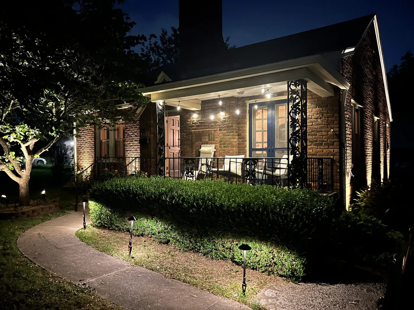 Porch, hedge and path on one circuit. Landscape Lighting by LIT Outdoor Lighting in Tulsa.