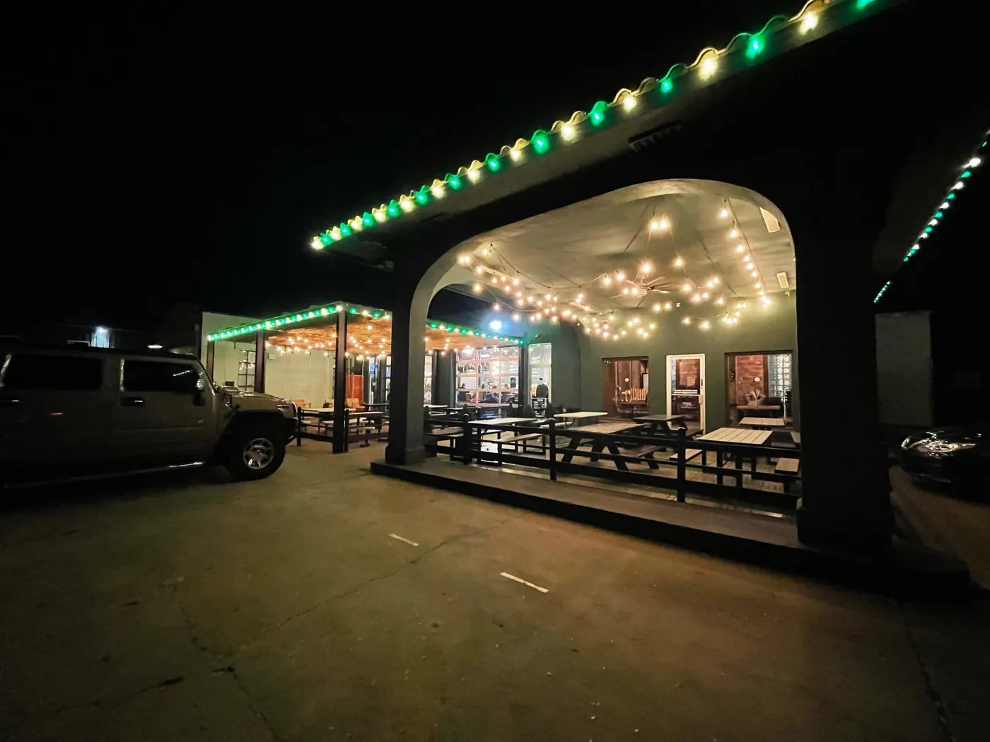 String lights under a pavilion. Christmas Lighting by LIT Outdoor Lighting in Tulsa.
